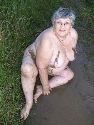 Naked granny in mud