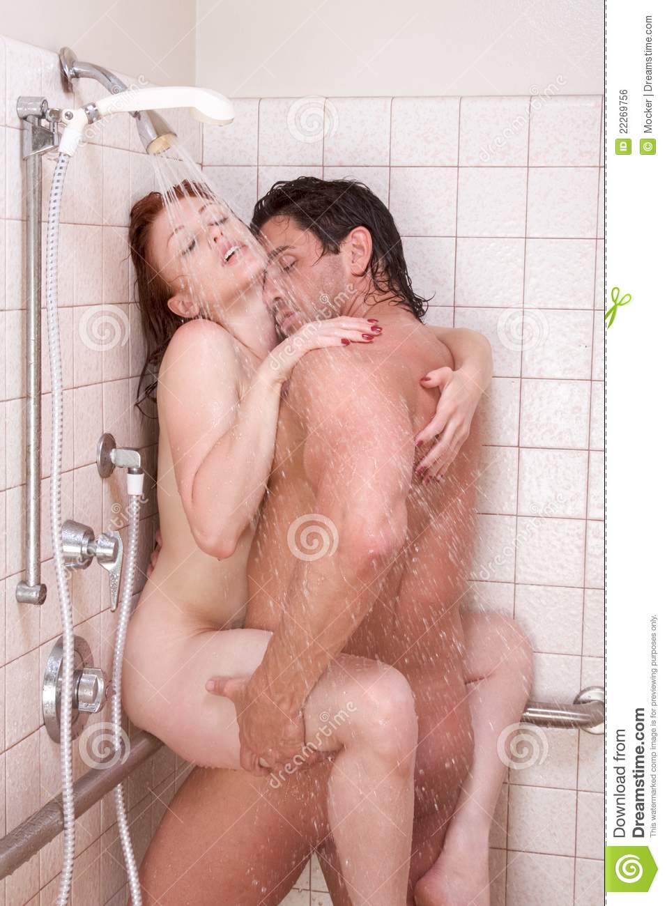 man and woman having sex in shower
