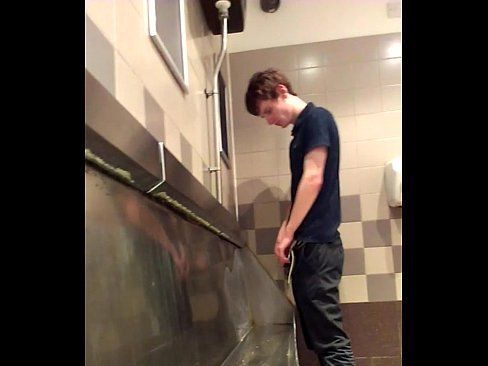 Boy pissing in public