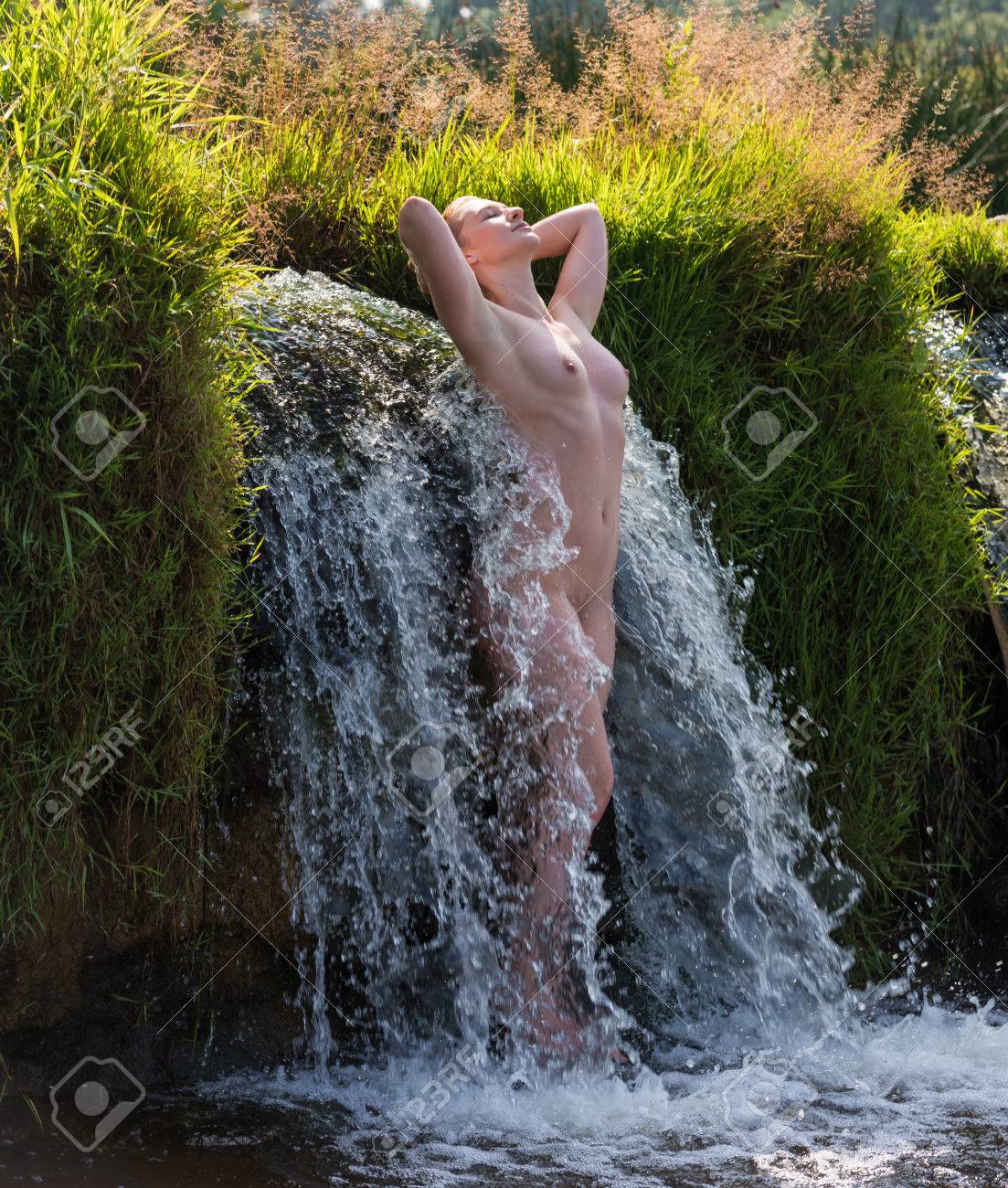 sex in front of waterfall